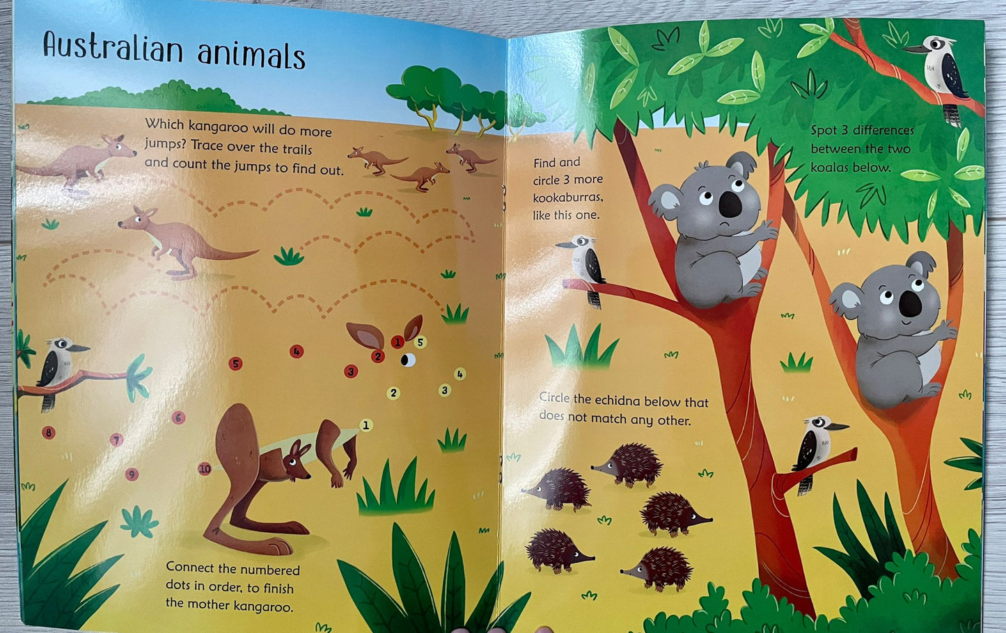 Carte de activități Usborne Wipe-Clean Animal Activities