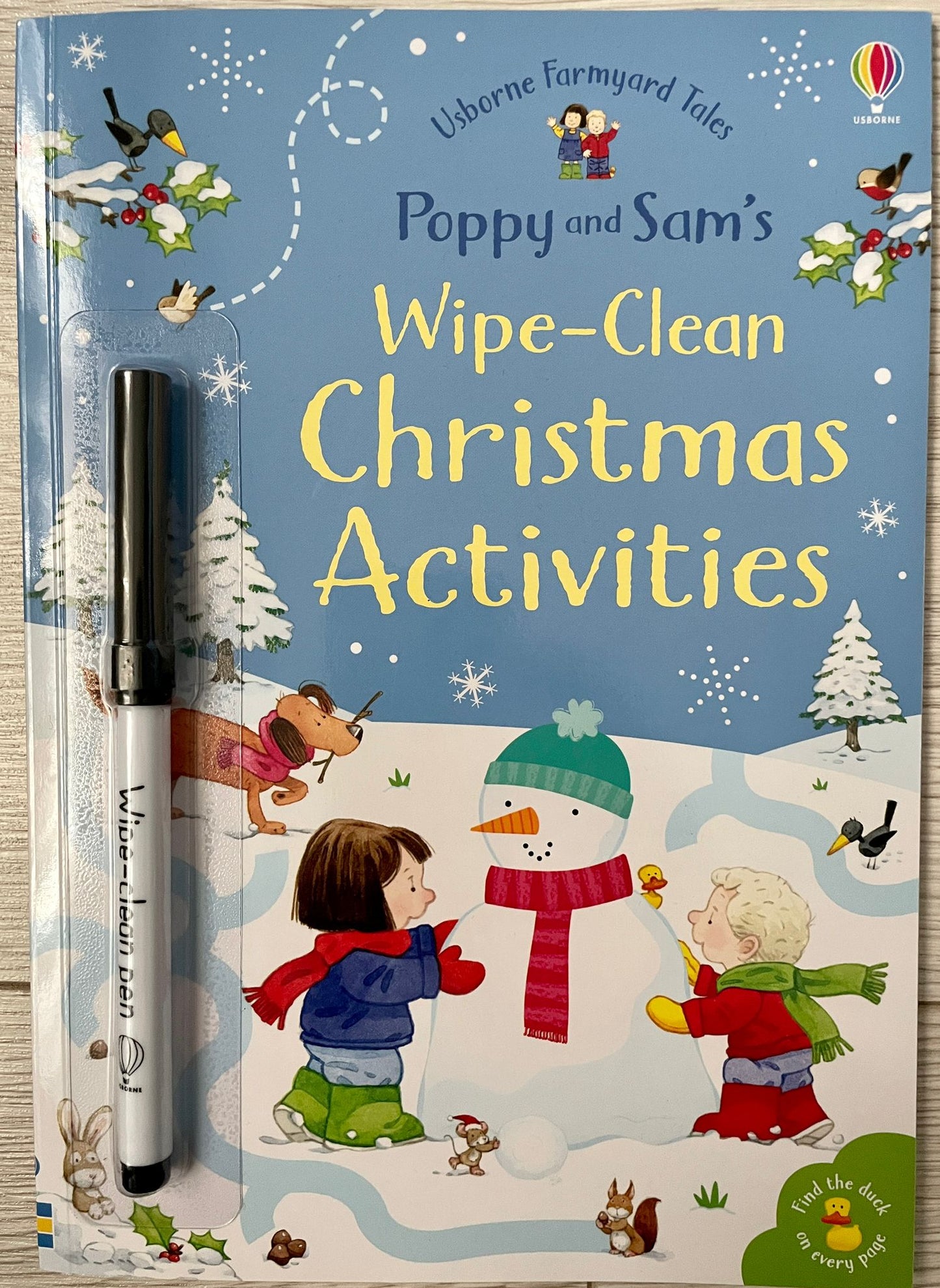 Carte de activități Usborne  Wipe-Clean Christmas Activities